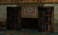 But, most interesting is a Bookcase to the SW, which, opened by a Tome, gives access to the true secrets of Nuhmudira's Dungeon (see description there)